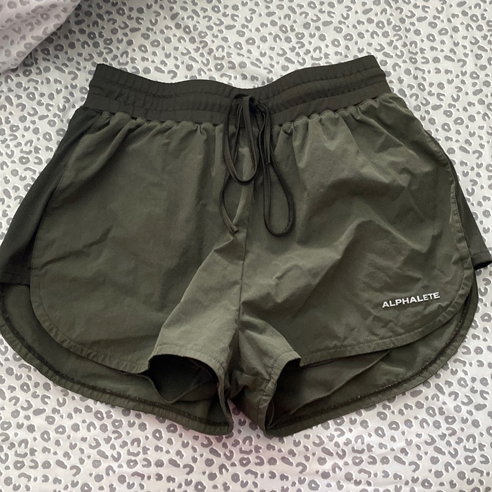 alphalete training shorts green size medium!